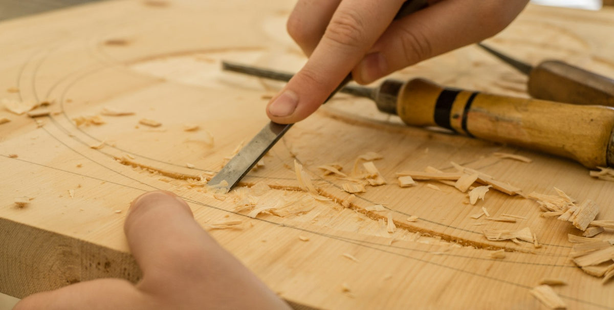 Shaping timber with a chisel by hand